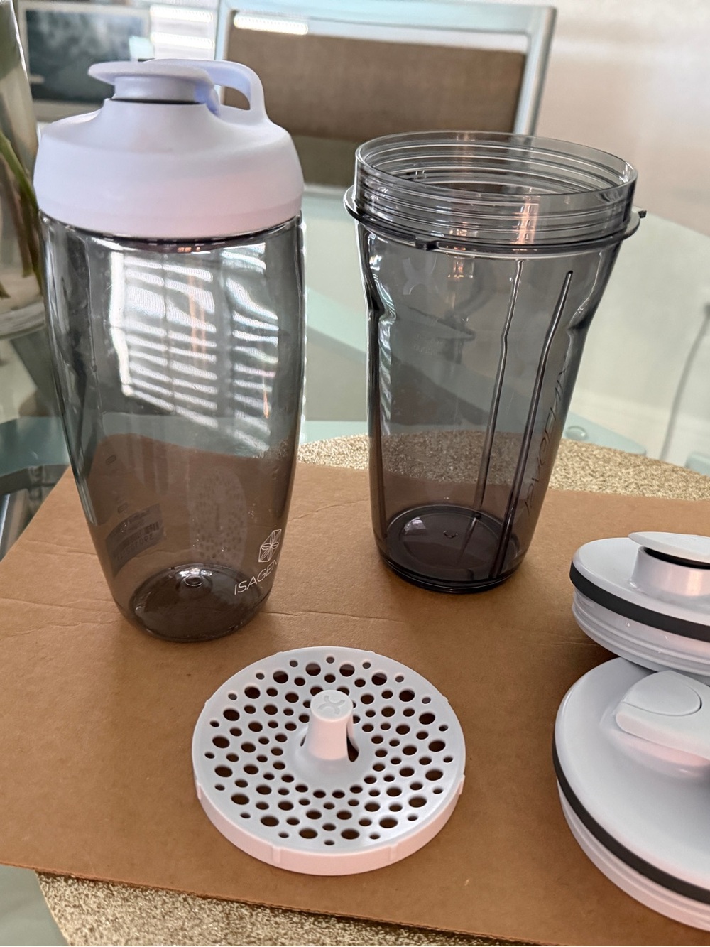 Isagenix Promixx bottle and separate shaker bottle with two lids